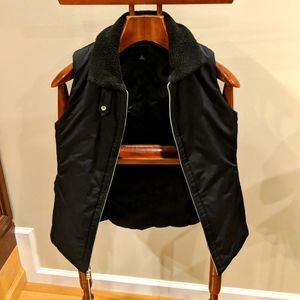 Banana Republic woman's black vest with fleece collar. Size S